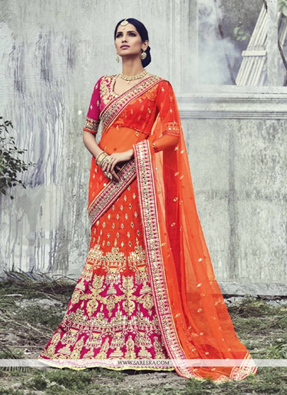Chiku & Orange Wedding Wear Woven & Embroidered Silk Lehenga Choli