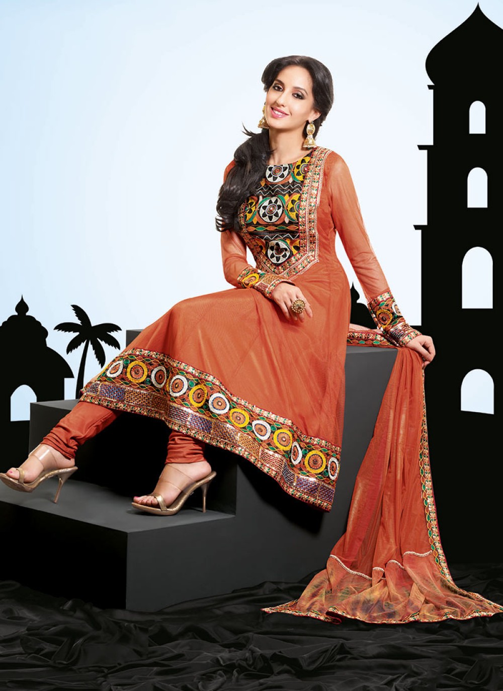 Rust Net Embroidered Churidar Suit
