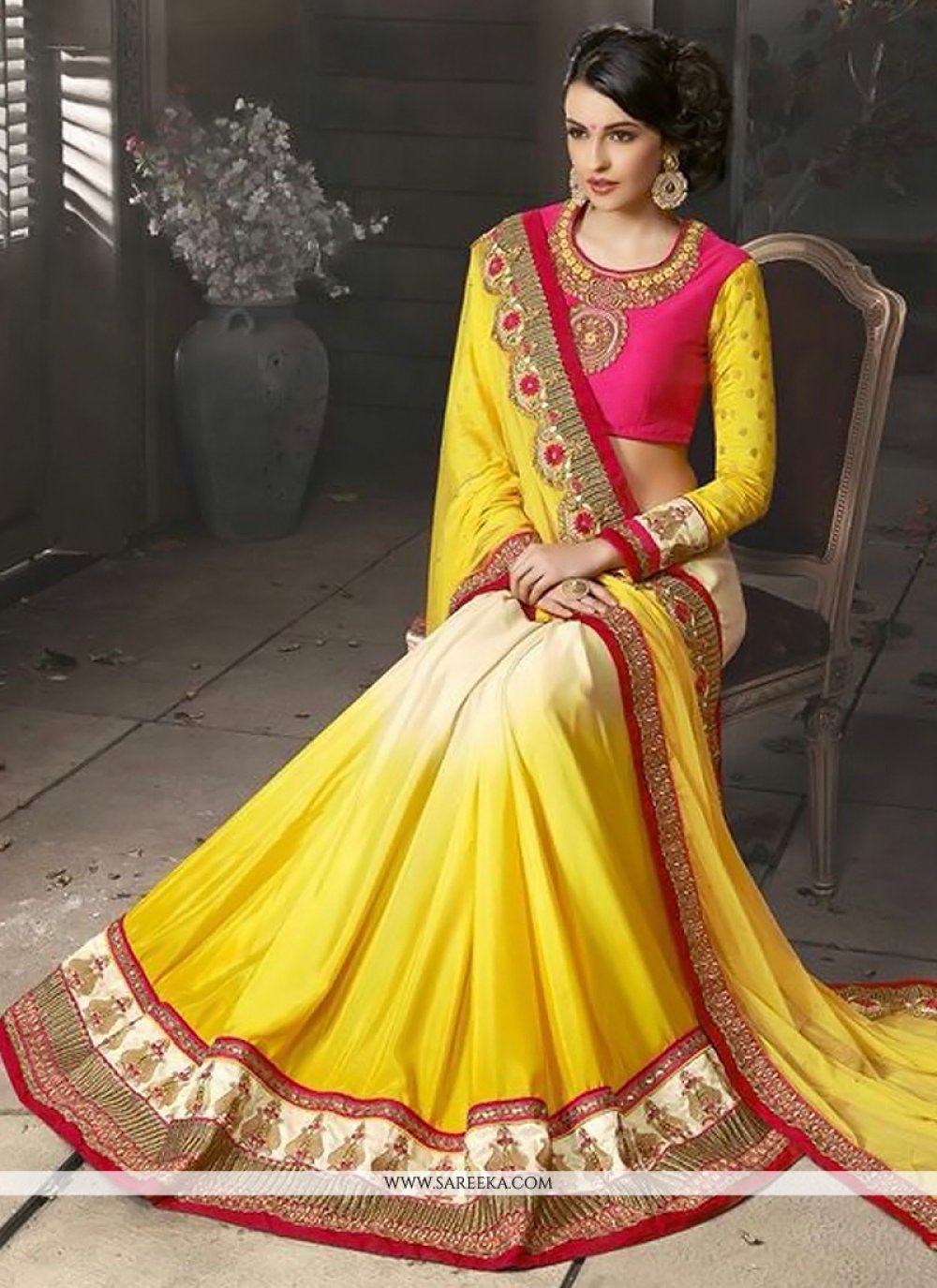 Yellow And Cream Soft Net And Georgette Saree