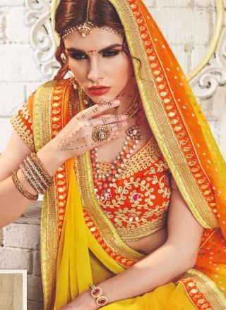 Embroidered Faux Georgette Shaded Saree in Orange and Yellow