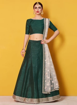 LEAF TO DARK GREEN OMBRÉ SHIMMERY LEHENGA SET WITH A HAND EMBROIDERED  BLOUSE PAIRED WITH A MATCHING DUPATTA AND FRILL DETAIL. - Seasons India