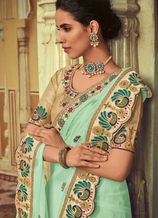 Embroidered Georgette Turquoise Classic Saree