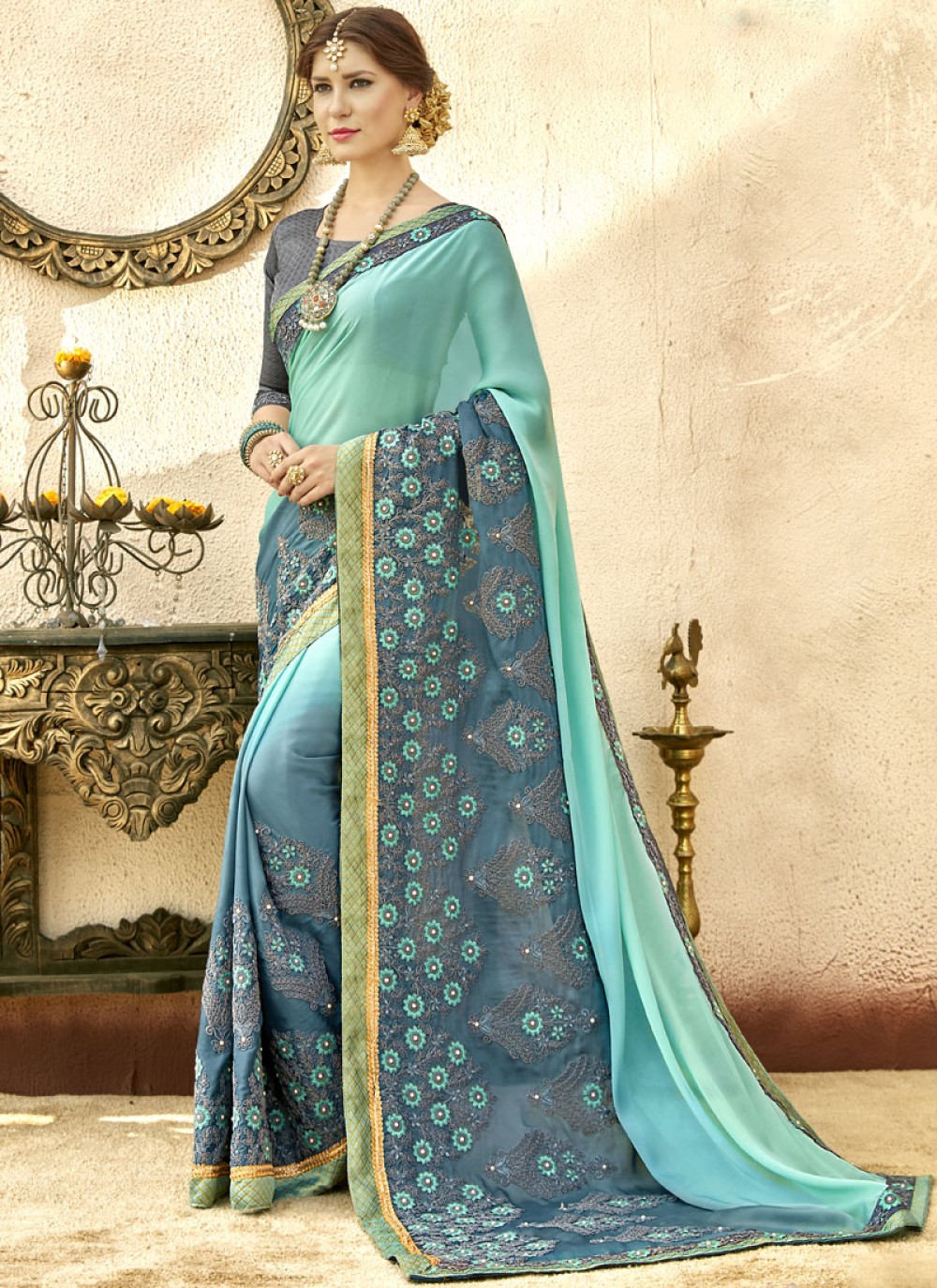 Faux Georgette Blue Embroidered Shaded Saree