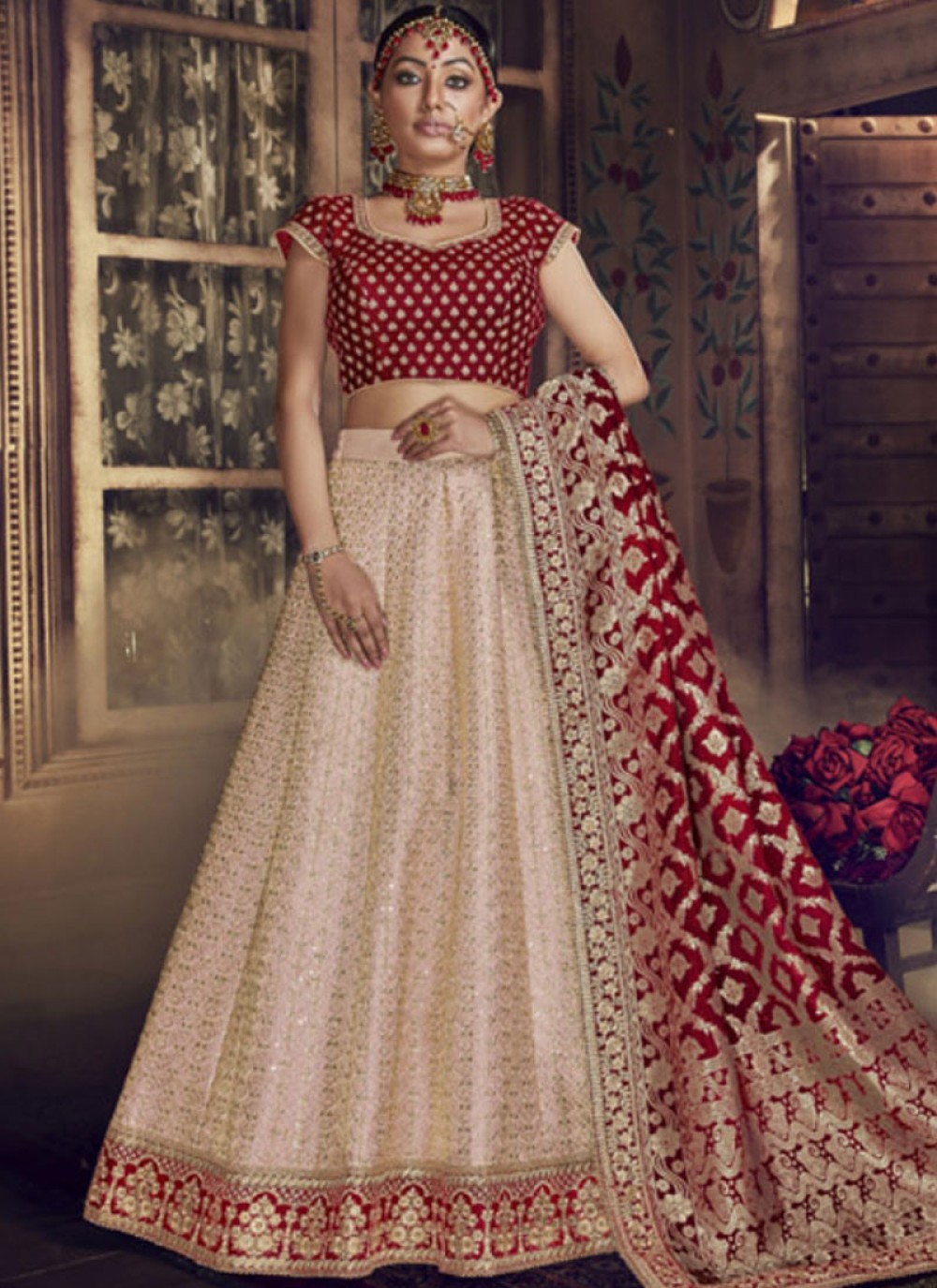 Bridal lehenga paired with peach color heavily embellished choli and peach  color net heavy embroidered border in peach and maroon  color.|lovelyweddingmall.com|