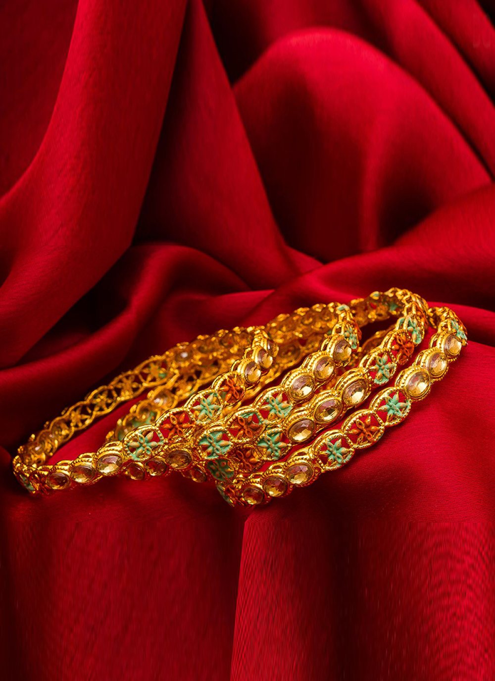 Stone Work Bangles in Gold