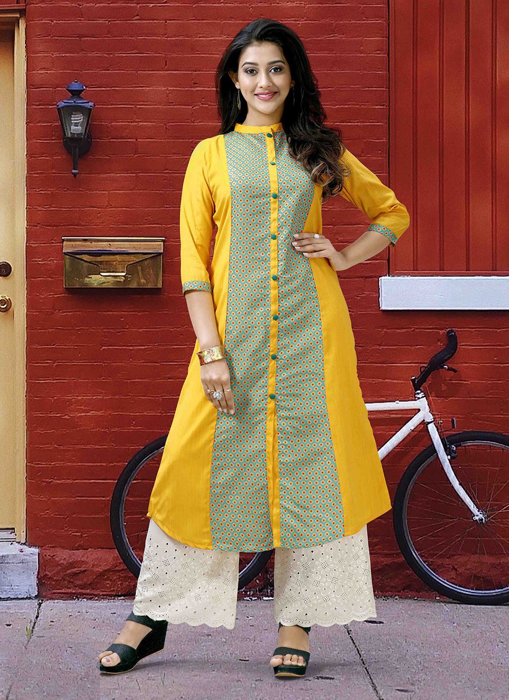 Divena Kurtis Kurtas and Tunics  Buy Divena Yellow Printed Cotton A Line Kurti  Online  Nykaa Fashion