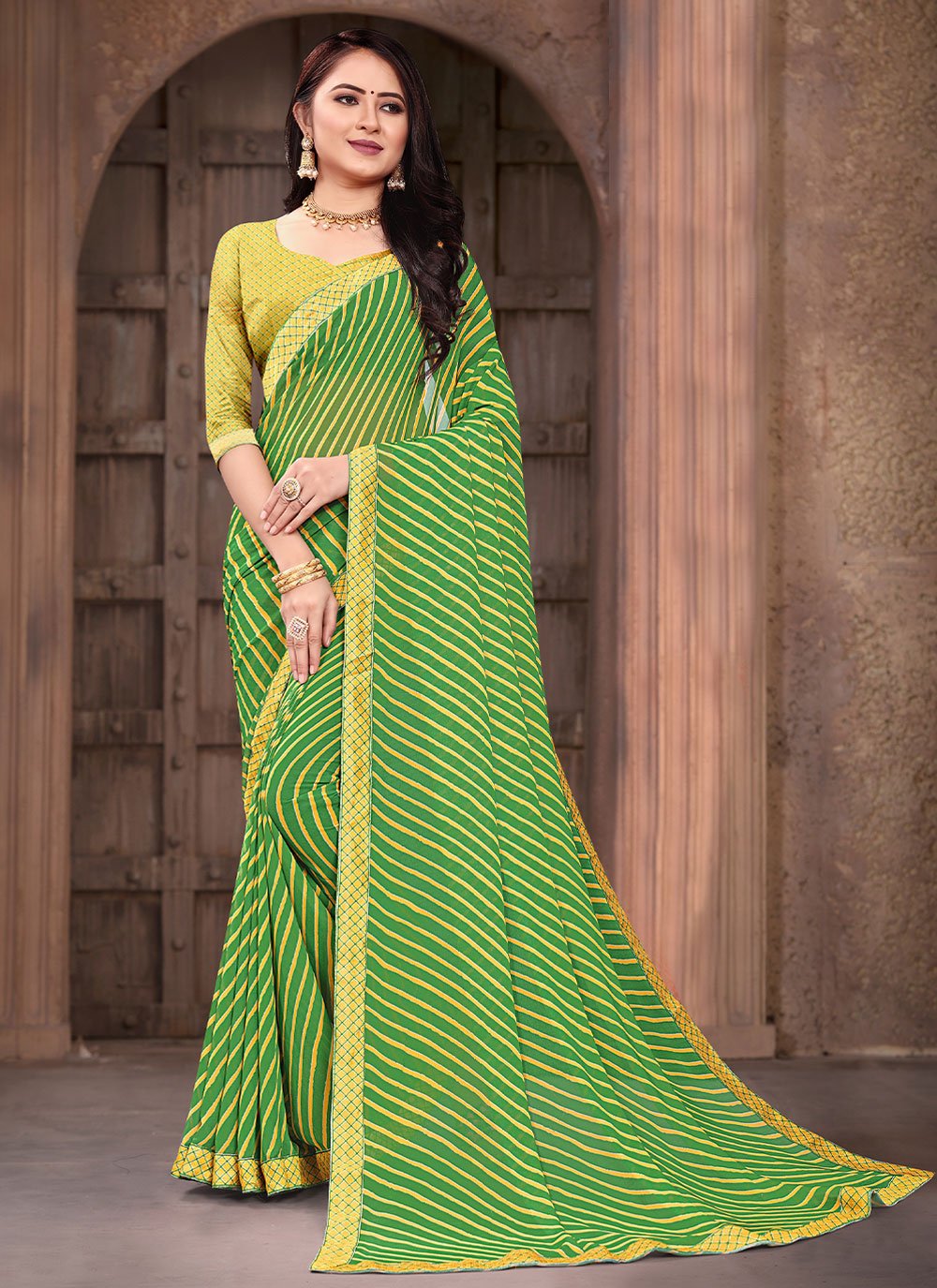 Border Weight Less Classic Saree in Green