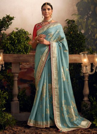 Aqua Blue Embroidered and Weaving Work Silk Trendy Saree