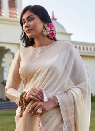 Auspicious Off White and Pink Georgette Classic Sari with Woven Work