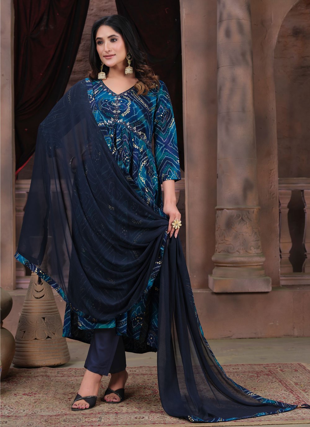 Surpassing Beige and Red Print Rayon Salwar Suit