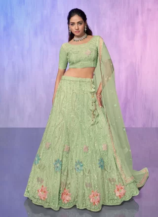 embroidered and resham work net lehenga choli in green 274246