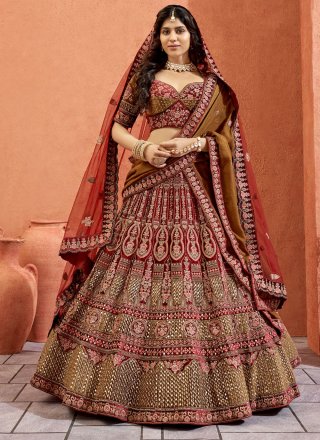 Maroon Colored heavy embroidered Bridal Wear Lehenga Choli - Rent