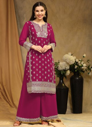 Embroidered Work Faux Georgette Palazzo Salwar Suit In Rani