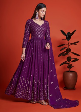 WINE MAGENTA GOWN SET WITH SILVER AND COLOURED EMBROIDERY AND GOTA WORK  PAIRED WITH A MATCHING DUPATTA WITH SILVER EMBELLISHMENTS. - Seasons India