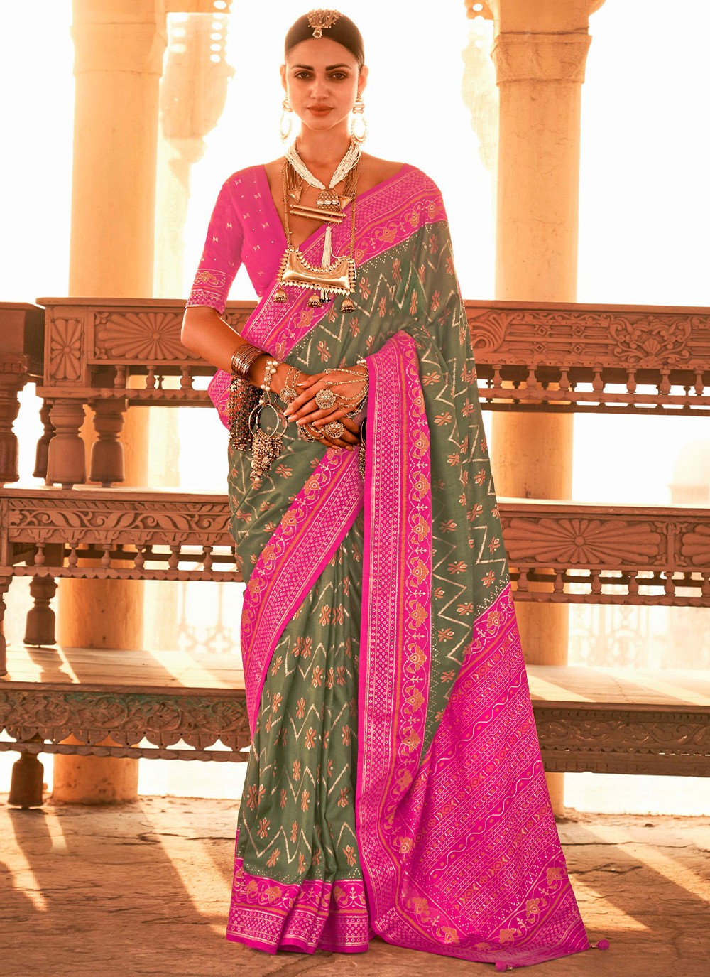Tvis and Bliss. Pink and Parrot Green Uppada Silk Saree