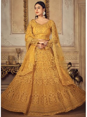 Stone Work Net A Line Lehenga Choli in Yellow