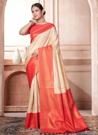 Adorable Cream and Orange Kanjivaram Silk Designer Saree with Woven Work