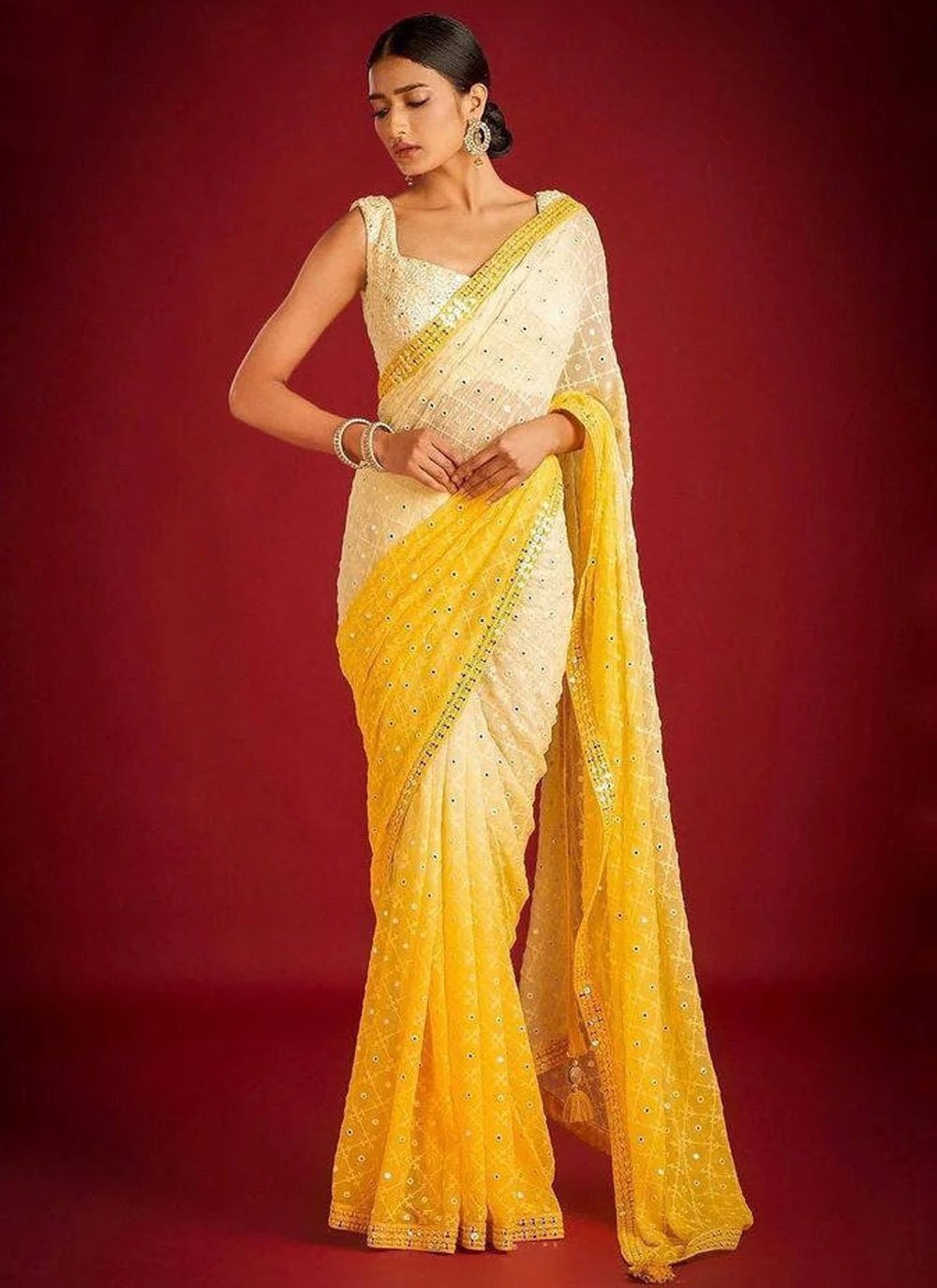 Off white and yellow stripes cotton saree with gold lace border