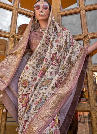 Angelic Cream Silk Designer Sari with Patch Border, Foil Print and Weaving Work