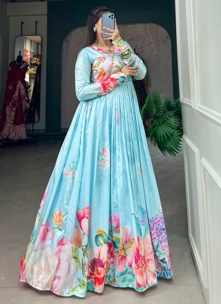 Compelling Blue Tussar Silk  Designer Gown with Floral Patch Work