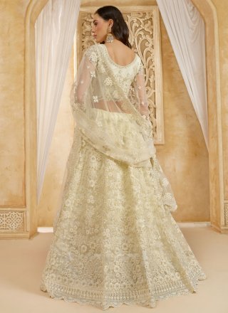 Cord, Stone and Thread Work Net Lehenga Choli In Cream