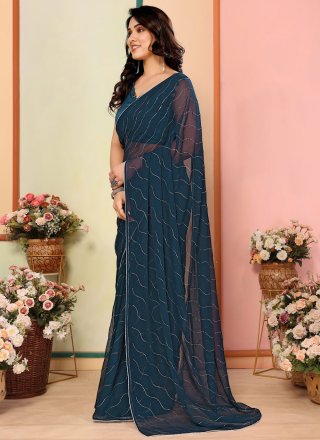 Deserving Blue and Teal Georgette Trendy Saree