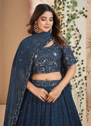 Embroidered and Sequins Work Faux Georgette Lehenga Choli In Blue