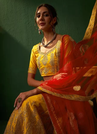 Embroidered and Zari Work Silk Lehenga Choli In Yellow