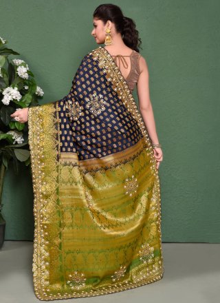 Embroidered, Mirror and Stone Work Kanjivaram Silk Contemporary Sari In Green and Blue for Festival