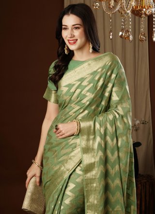 Green Pure Georgette Designer Saree with Weaving Work