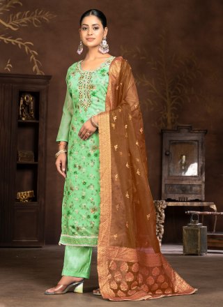 Magnetic Green Art Silk Palazzo Salwar Suit with Hand and Print Work