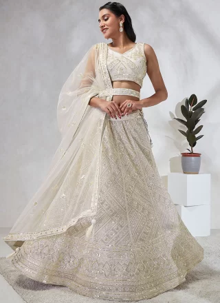 Buy Off-White Pearl Embroidered Net Exclusive Bridal Lehenga Online |  Samyakk
