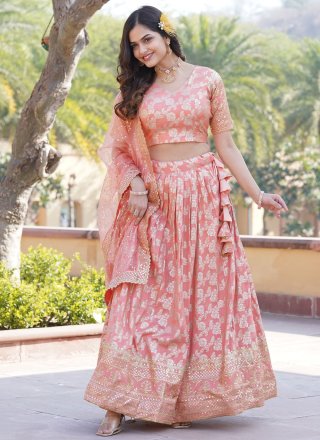 Outstanding Peach Jacquard Lehenga Choli with Embroidered and Sequins Work