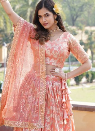 Outstanding Peach Jacquard Lehenga Choli with Embroidered and Sequins Work