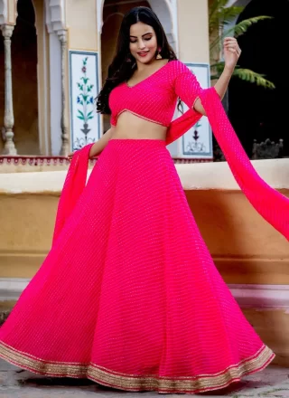 Pink and Rani Georgette Lehenga Choli with Lace and Zari Work