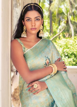 Pleasing Turquoise Silk Classic Saree with Woven Work