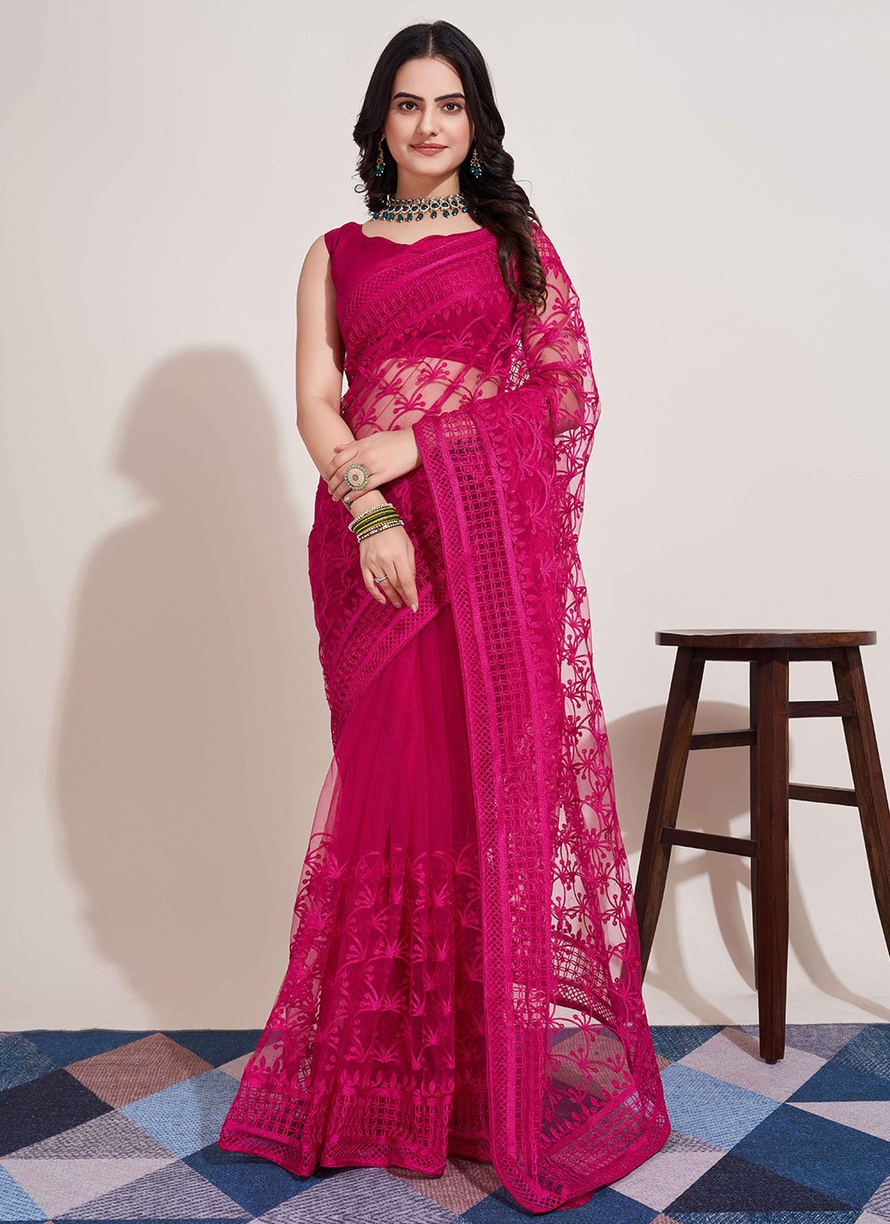 Rani pink color banarasi silk saree with zari weaving work