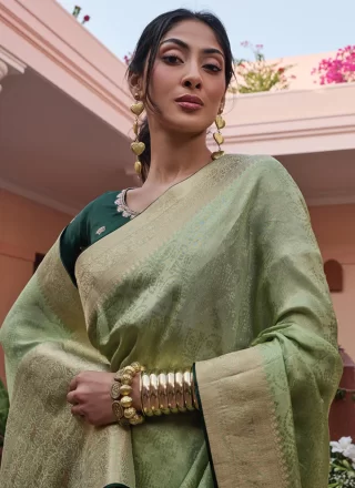 Riveting Green Viscose Trendy Saree with Weaving Work