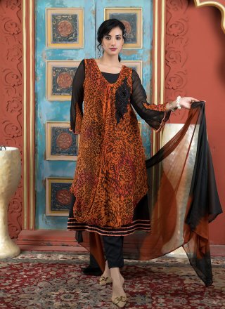 Snazzy Rust Georgette Pant Style Suit