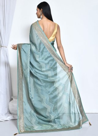 Splendid Turquoise Satin Silk Contemporary Saree with Woven Work