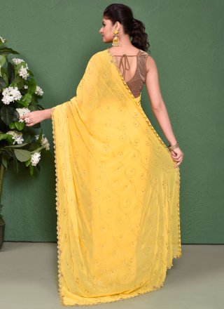 Staggering Yellow Georgette Trendy Saree with Cut and Embroidered Work