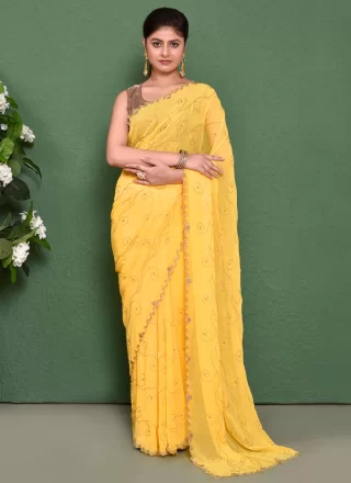 Staggering Yellow Georgette Trendy Saree with Cut and Embroidered Work