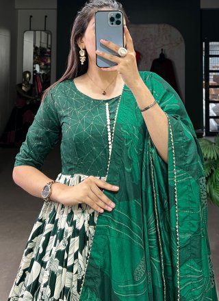 Suave Green Tussar Silk  Designer Gown with Floral Patch and Foil Print Work