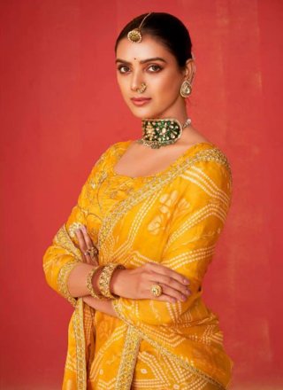 Tempting Yellow Chiffon Trendy Saree with Embroidered and Foil Print Work
