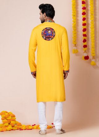 Yellow Rayon Kurta Pyjama with Lace, Machine Embroidery and Patch Border Work for Festival