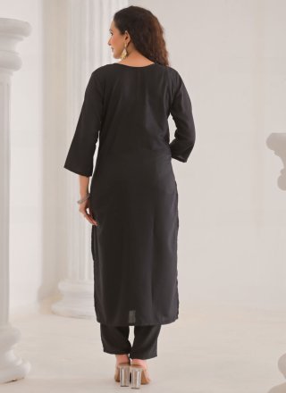 Adorning Black Rayon Salwar Suit with Embroidered Work