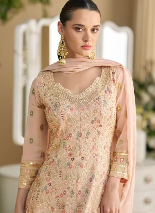 Alluring Peach and Pink Georgette Salwar Suit