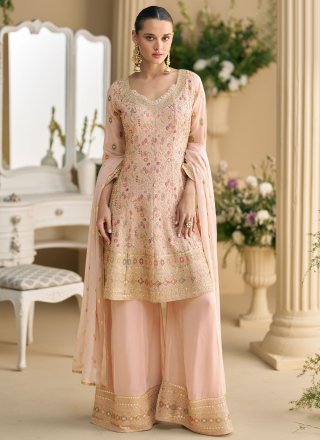 Alluring Peach and Pink Georgette Salwar Suit