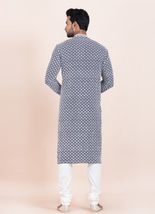 Amusing Blue and White Rayon Kurta Pyjama with Embroidered and Sequins Work