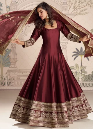 Appealing Maroon Vichitra Silk Designer Gown with Embroidered and Sequins Work